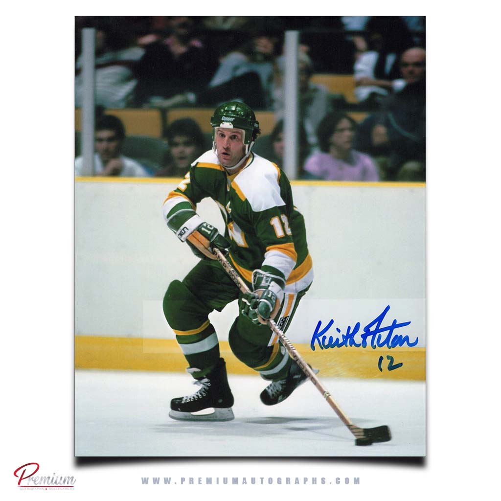 Keith Acton Minnesota North Stars Autographed 8x10 Photograph with the Puck
