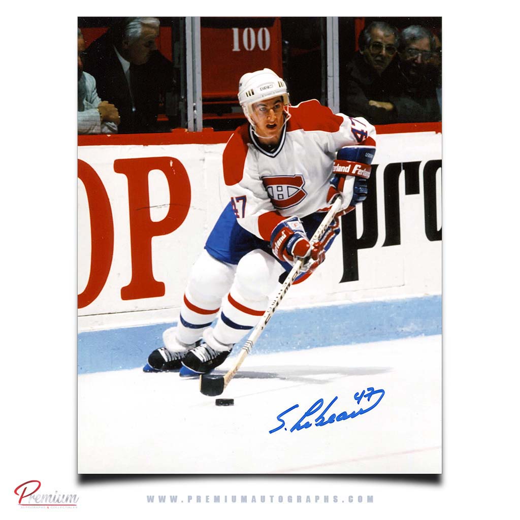 Stephan Lebeau Montreal Canadiens Signed 8x10 Photograph with Puck Along the Boards