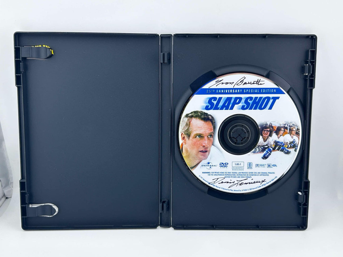 Denis Lemieux Universal Slap Shot Autographed on DVD w/ Yvon Barette Inscription
