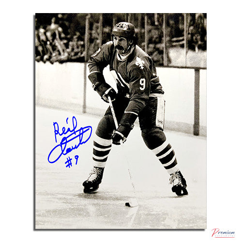 Real Cloutier Quebec Nordiques Autographed 8x10 Photograph With the Puck