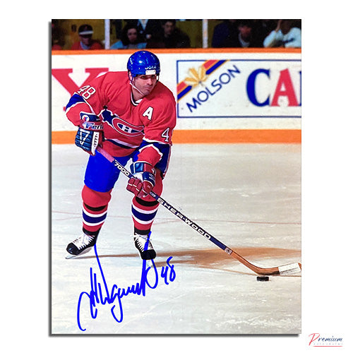 J.J. Daigneault Montreal Canadiens Signed 8x10 Photograph with the Puck