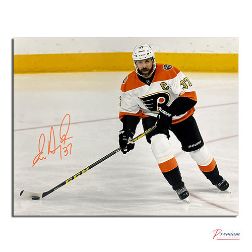 Eric Desjardins Philadelphia Flyers Signed 8x10 Photograph with the Puck