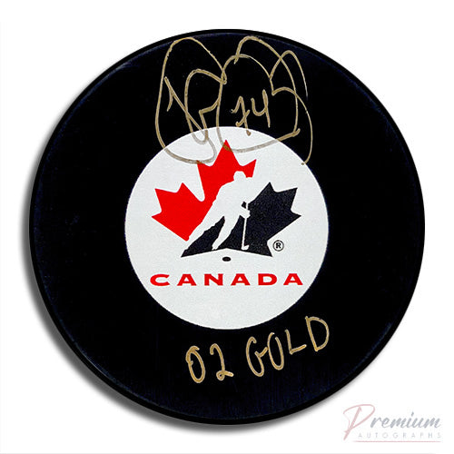 Theo Fleury Canada Signed Puck w/ 02 Gold Inscription