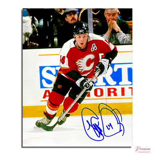 Theo Fleury Calgary Flames Signed 8x10 Photograph with Puck