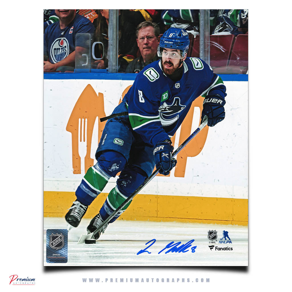 Conor Garland Vancouver Canucks Signed 8x10 Photograph with Puck