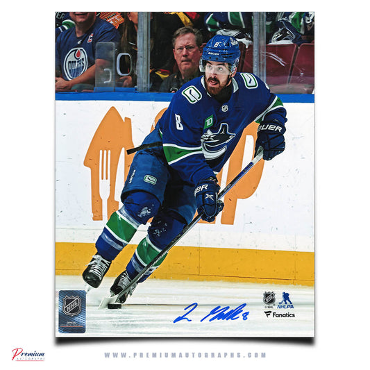 Conor Garland Vancouver Canucks Signed 8x10 Photograph with Puck