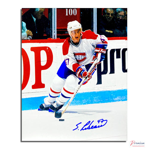 Stephan Lebeau Montreal Canadiens Signed 8x10 Photograph with Puck Along the Boards