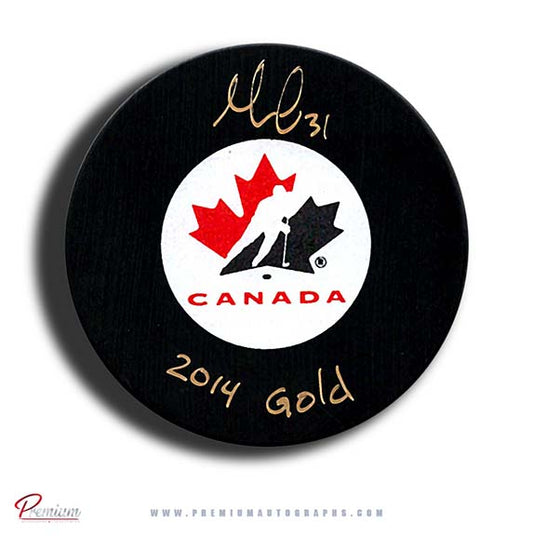 Genevieve Lacasse Team Canada Autographed Puck w/ 2014 Gold Inscription