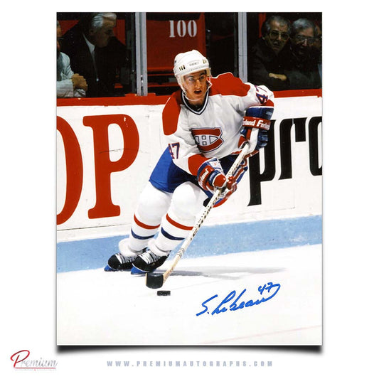 Stephan Lebeau Montreal Canadiens Signed 8x10 Photograph with Puck Along the Boards