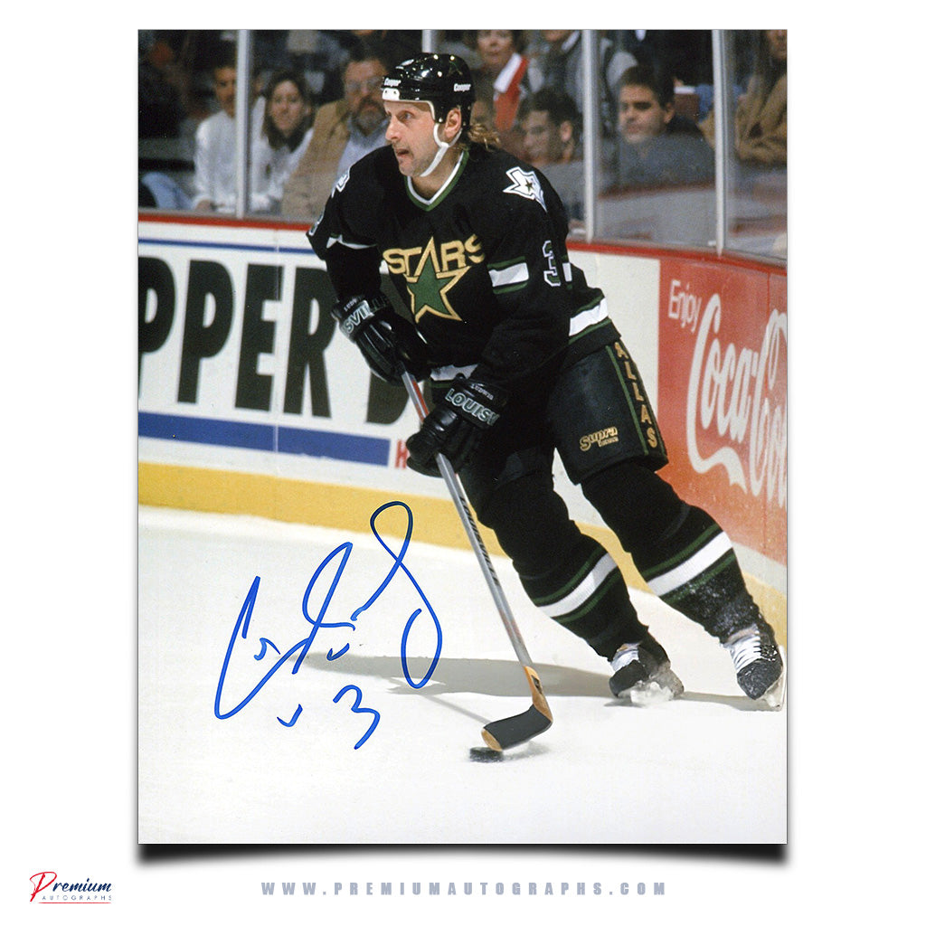 Craig Ludwig Dallas Stars Signed 8x10 Photograph with the Puck