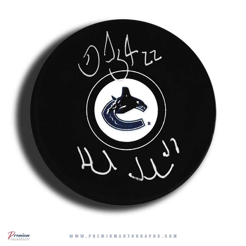 Daniel & Henrik Sedin Vancouver Canucks Signed Puck