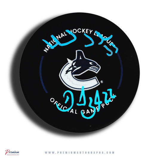 Daniel & Henrik Sedin Vancouver Canucks Signed Offical Game Puck