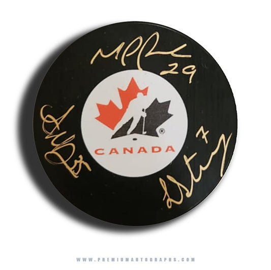 Ann-Renee Desbiens, Marie-Philip Poulin & Laura Stacey Team Canada Signed Puck