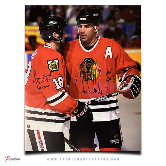 Denis Savard & Chris Chelios Chicago Blackhawks Signed 11x14 Photograph Conversation w/ HOF 2000 & HOF 2013 Inscriptions