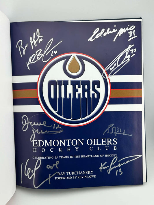 Edmonton Oilers Hockey Club by Ray Turchansky Autographed by Bill Ranford, Dave Hunter, Kevin Lowe, Ken Linesman, Grant Fuhr, Kelly Buchberger, Eddie Mio & Garry Unger silver paint pen