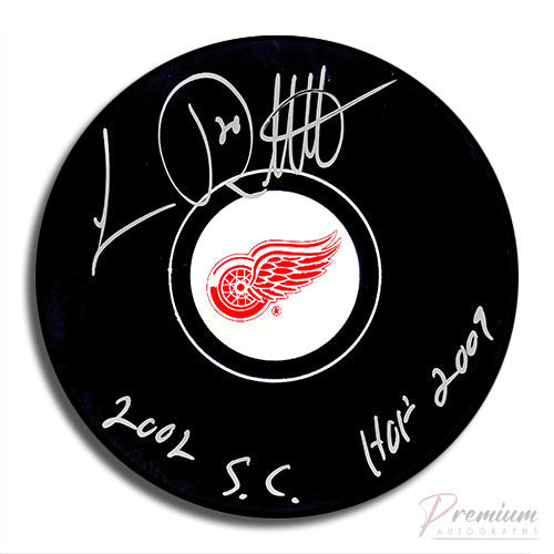 Luc Robitaille Detroit Red Wings Signed Puck w/ 2002 SC & HOF 2009 Inscription