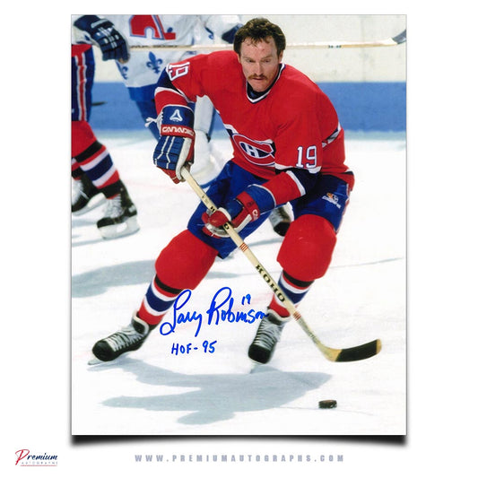 Larry Robinson Montreal Canadiens Signed 8x10 Photograph Making a Play w/ HOF 95 Inscription