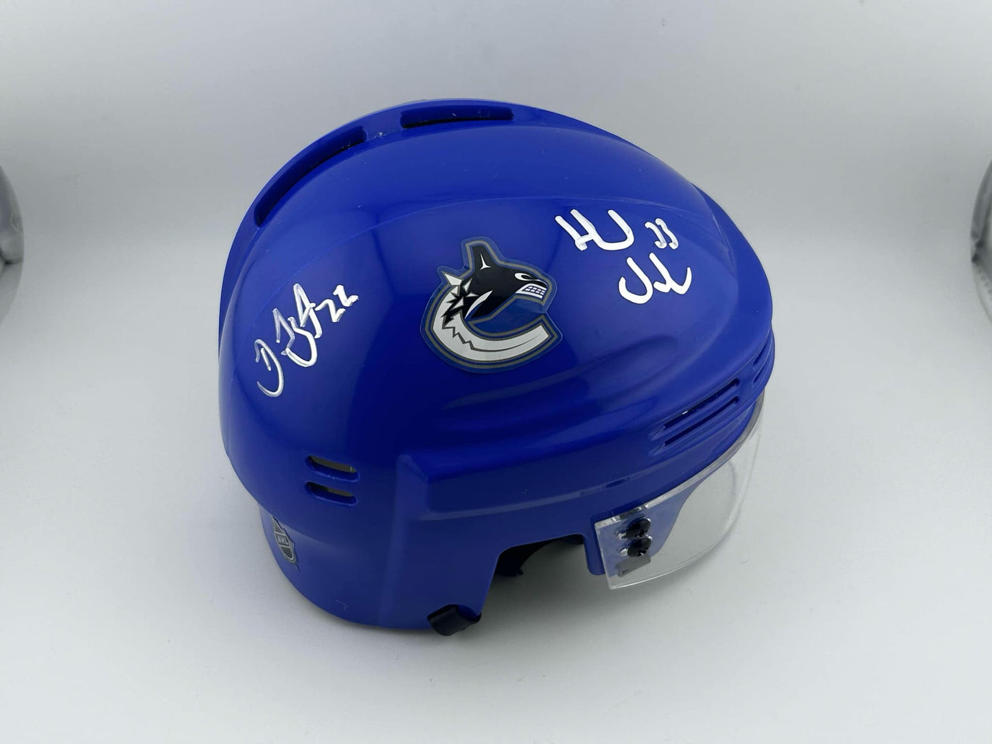 Daniel & Henrik Sedin Vancouver Canucks Autographed Home Blue Mini Helmet