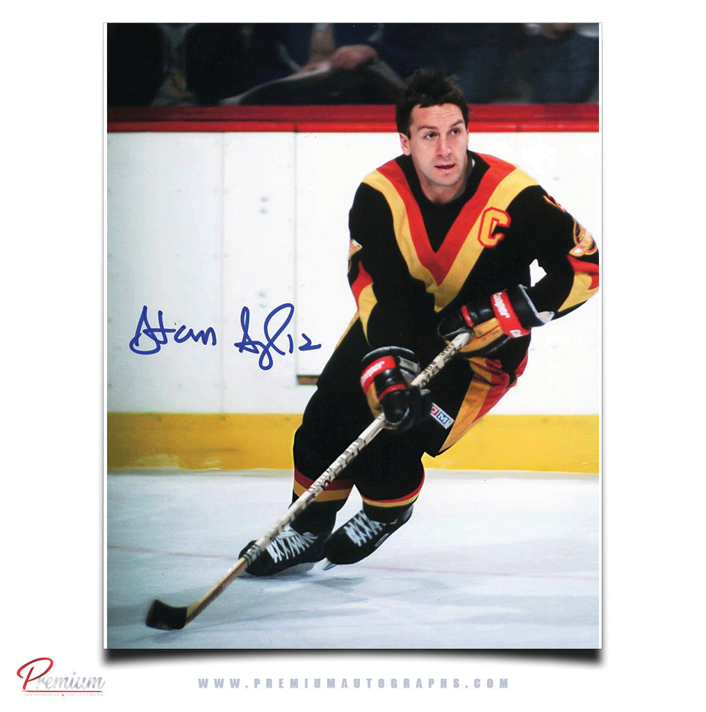 Stan Smyl Vancouver Canucks Autographed 8x10 Photograph with the Puck