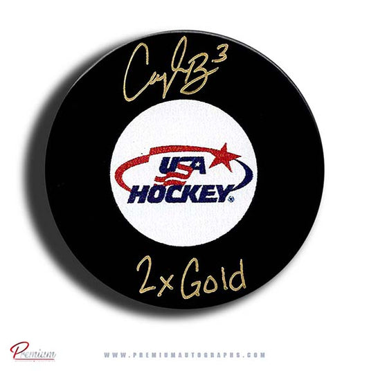 Cayla Barnes Team USA Autographed Puck w/ 2x Gold Inscription